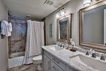 Completely renovated Master bathroom with new tile and double vanity.